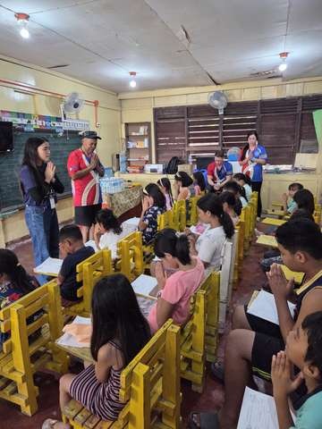 A photograph from an ARMS outreach.