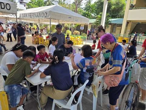 A photograph from an ARMS outreach.